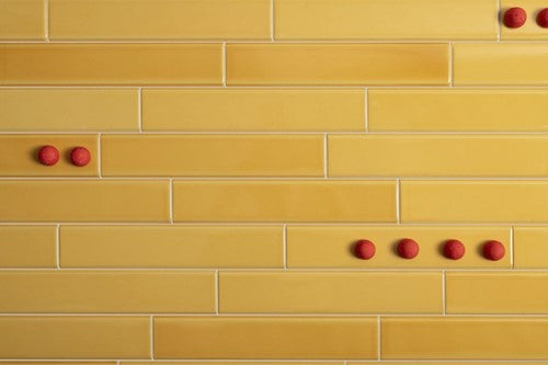 Quintessenza Tinte wandtegel Giallo Lucido 5 x 25 cm